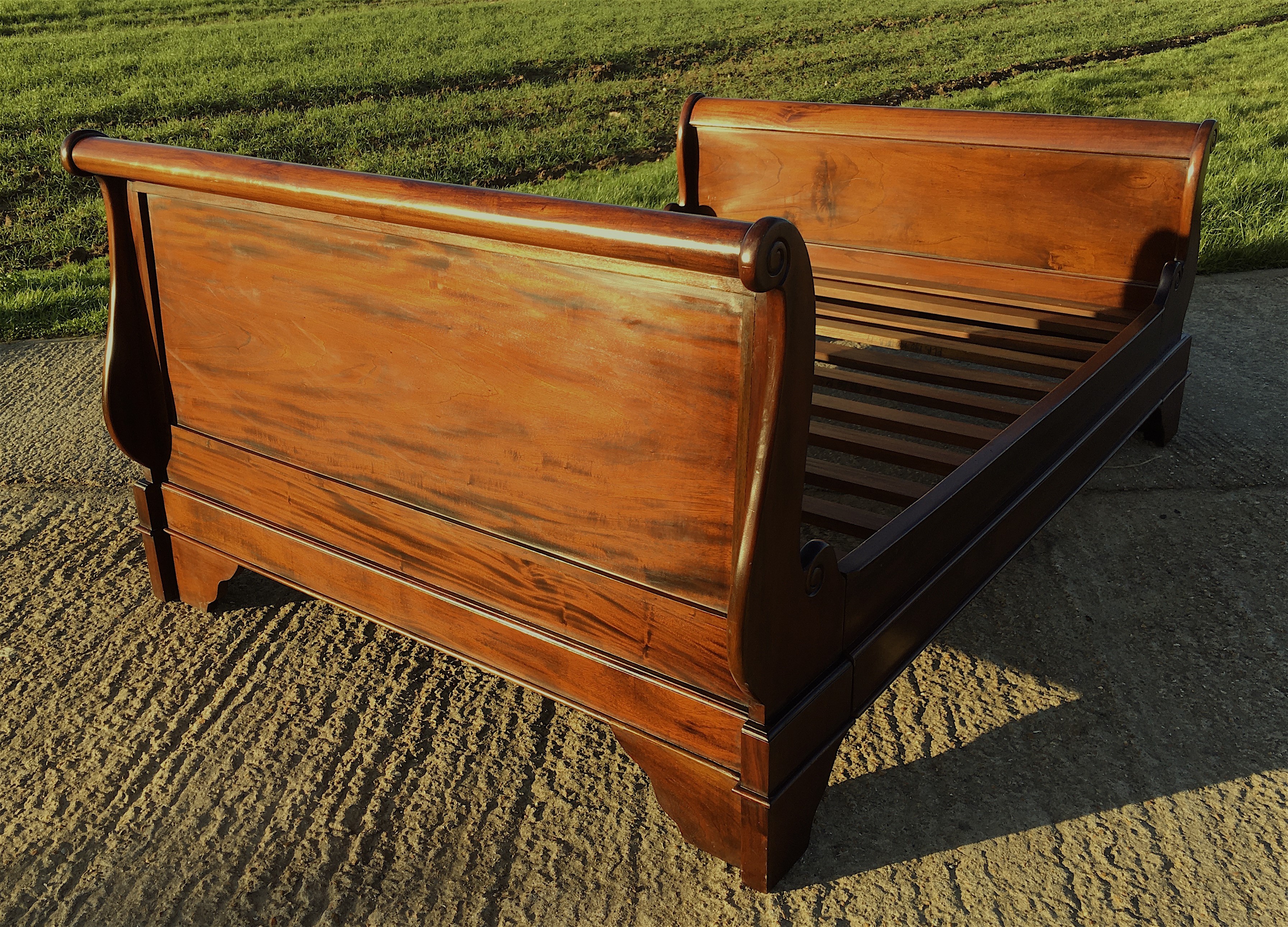 A French style mahogany sleigh bed, length 210cm, width 148cm